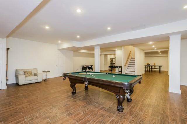 299 Ridgefield Road Wilton, CT 06897 - Photo 22 of 29 a room with pool table and windows