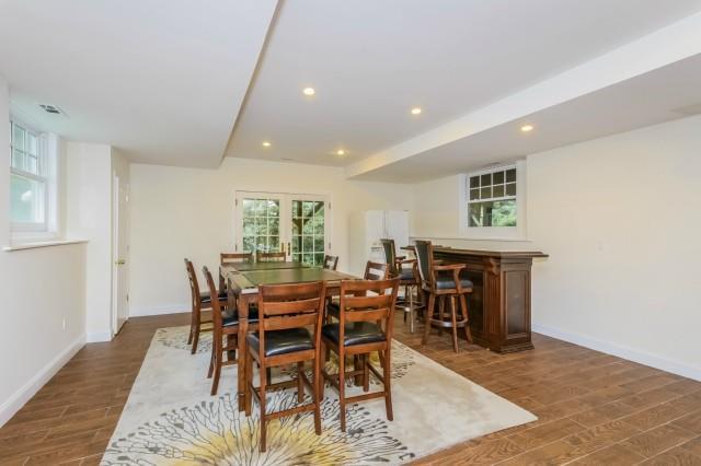 299 Ridgefield Road Wilton, CT 06897 - Photo 23 of 29 a dining room with furniture and wooden floor