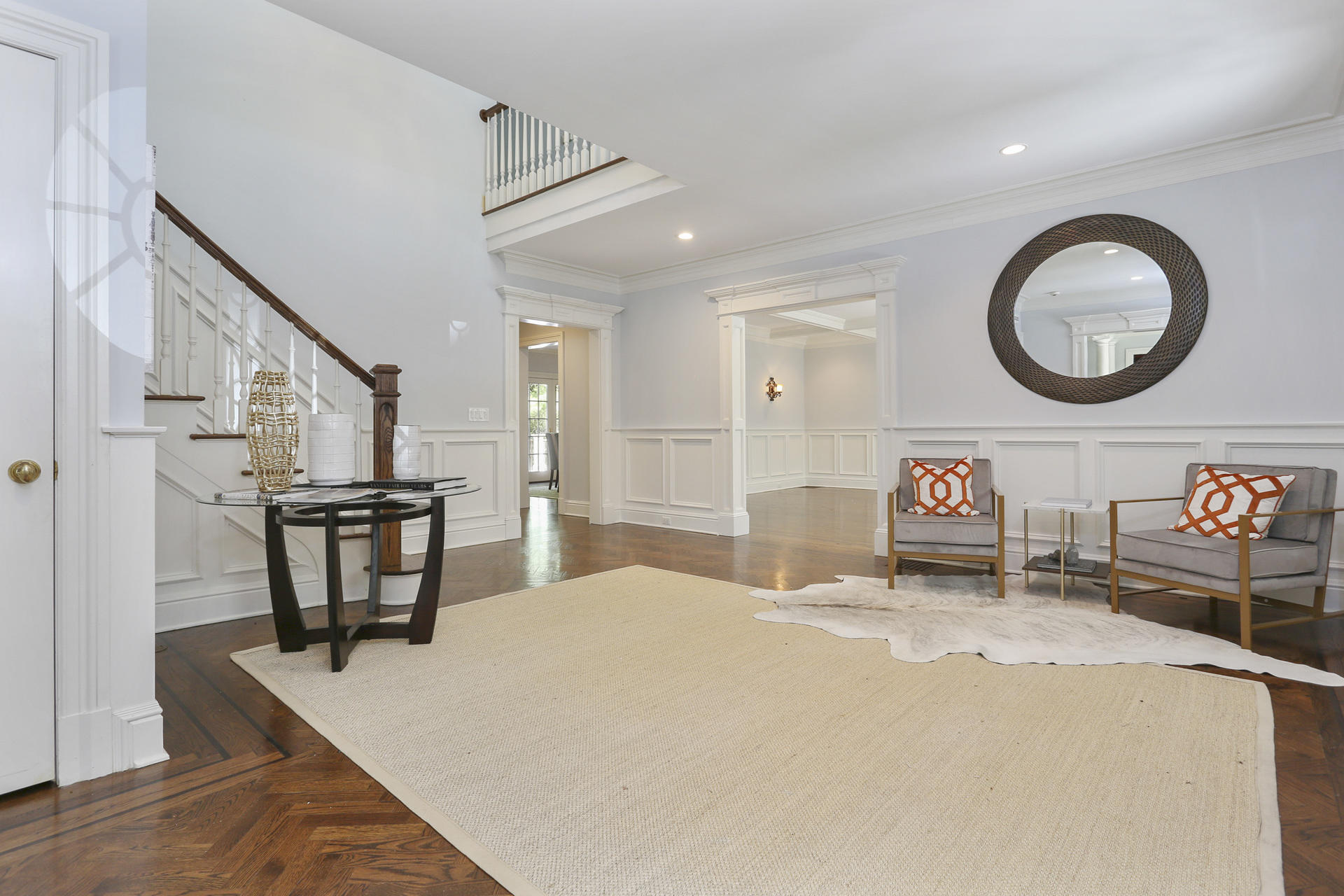 299 Ridgefield Road Wilton, CT 06897 - Photo 3 of 29 a bedroom with a bed a mirror and a table