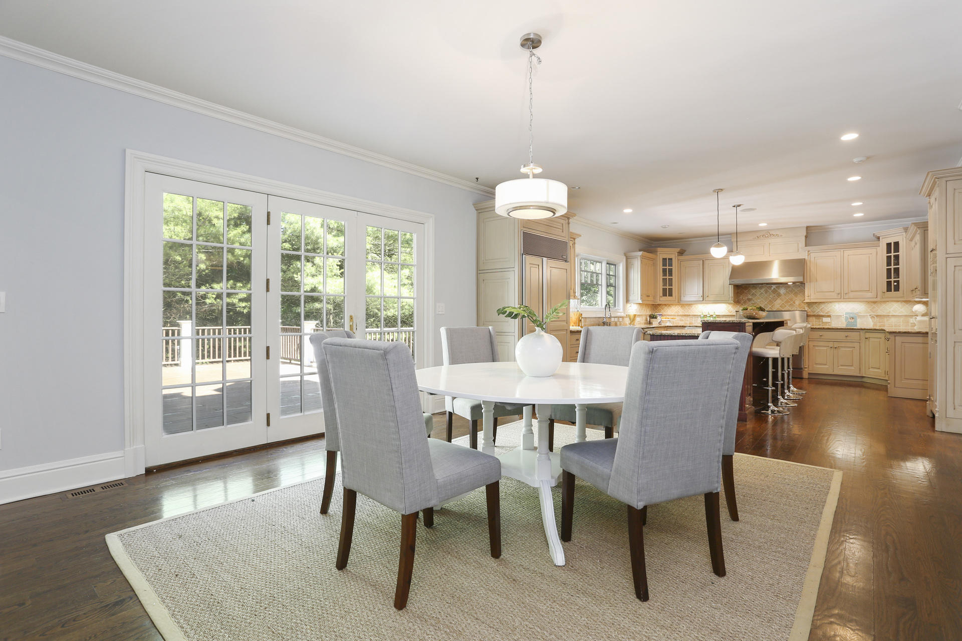 299 Ridgefield Road Wilton, CT 06897 - Photo 8 of 29 a view of a dining room with furniture window and wooden floor