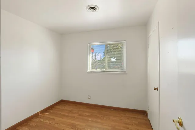 an empty room with a workspace