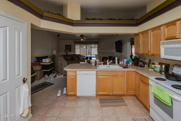 a view of a livingroom with furniture and window