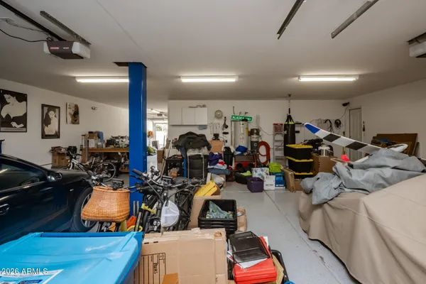 a view of a kitchen with electric appliances