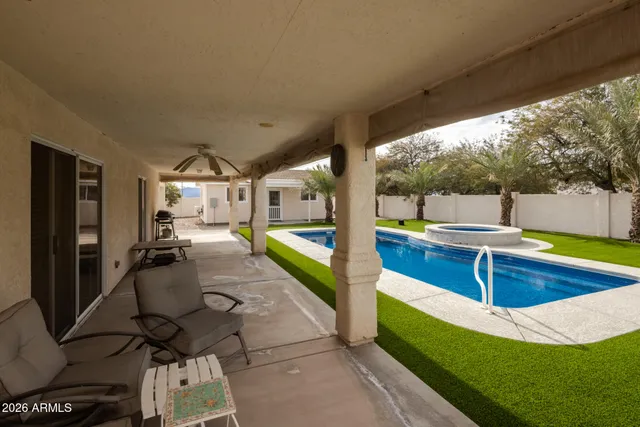 a view of a house with swimming pool