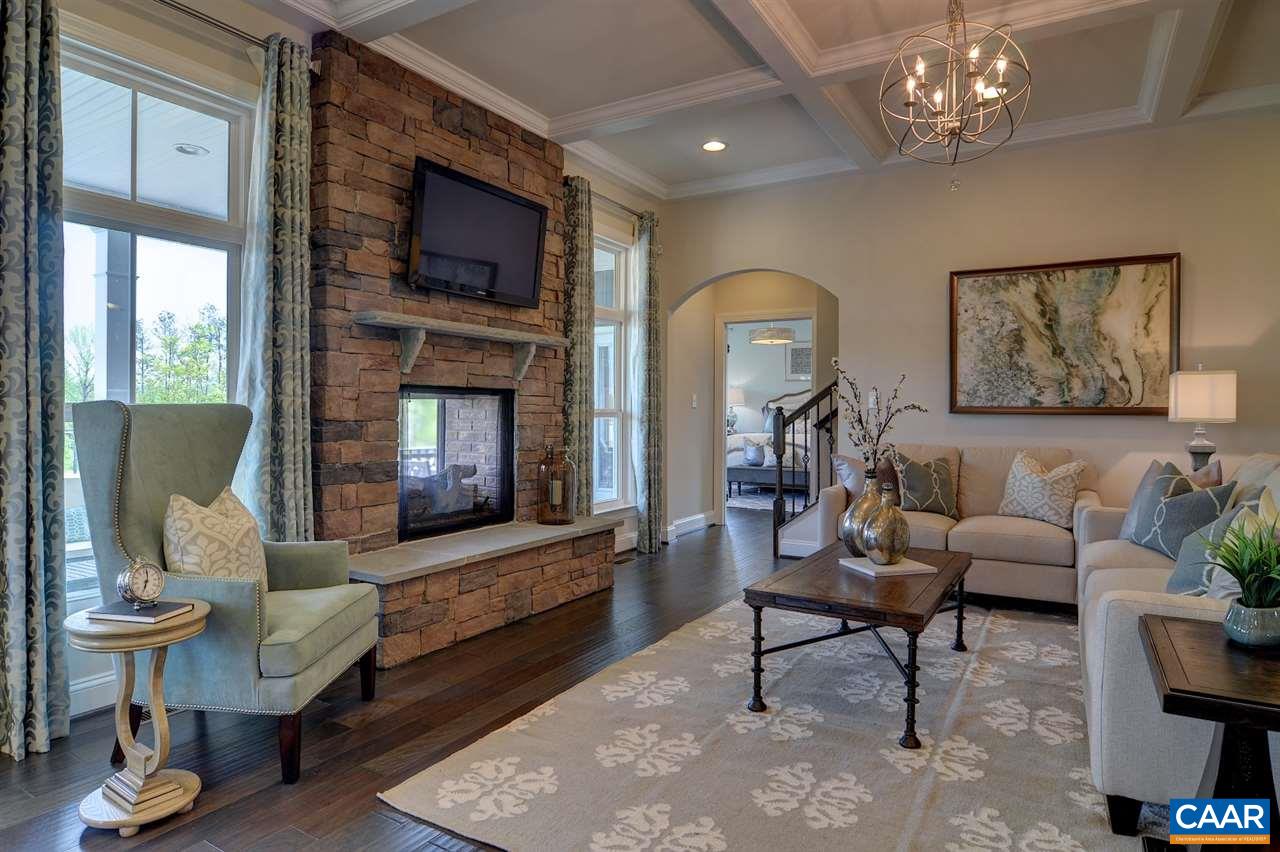216 Ridgemont Road Ruckersville, VA 22968 - Photo 2 of 12 a living room with furniture and a fireplace