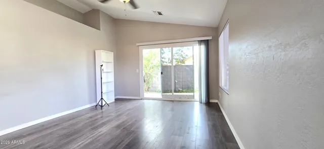 a view of wooden floor in an empty room
