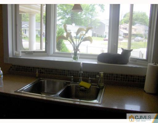 35 Windsor Road Edison, NJ 08817 - Photo 8 of 10 a kitchen sink with a window