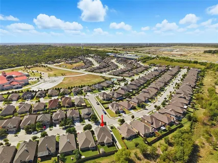 an aerial view of residential building and ocean