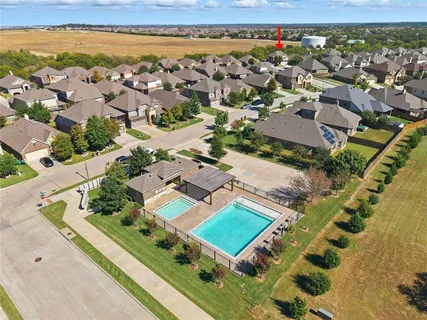 an aerial view of residential building with outdoor space