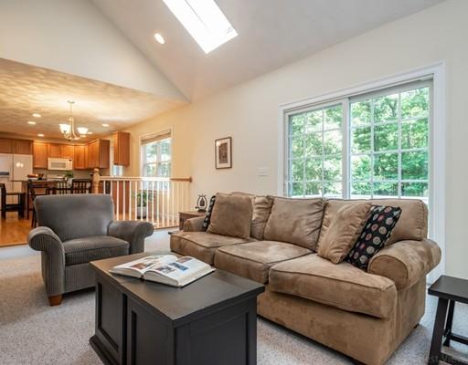 337 Springs Road Bedford, MA 01730 - Photo 12 of 30 a living room with furniture and a large window