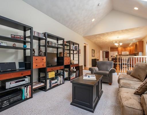 337 Springs Road Bedford, MA 01730 - Photo 13 of 30 a living room with furniture and a flat screen tv