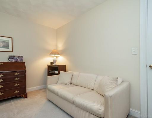 337 Springs Road Bedford, MA 01730 - Photo 25 of 30 a living room with furniture and a dresser