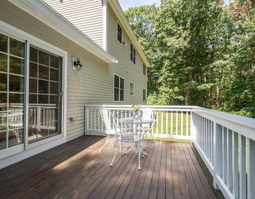 337 Springs Road Bedford, MA 01730 - Photo 27 of 30 a view of balcony with wooden floor and fence