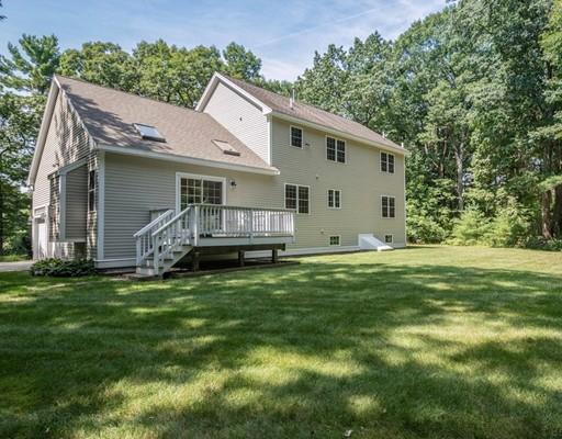 337 Springs Road Bedford, MA 01730 - Photo 29 of 30 a view of a house with a yard