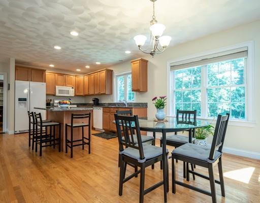 337 Springs Road Bedford, MA 01730 - Photo 10 of 30 a view of a dining room with furniture window and outside view
