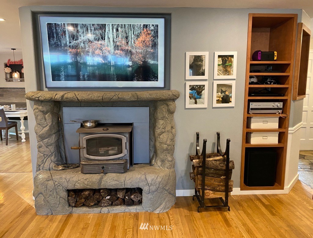 14530 166th Place Southeast Renton, WA 98059 - Photo 12 of 30 a living room with furniture and a fireplace