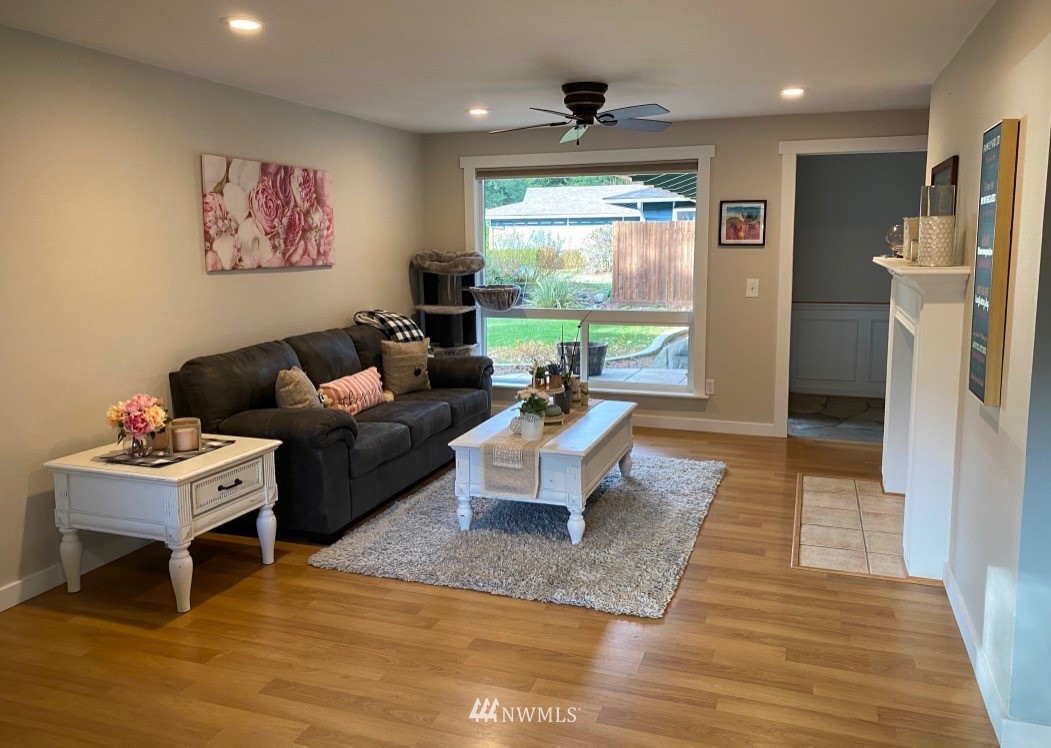 14530 166th Place Southeast Renton, WA 98059 - Photo 13 of 30 a living room with furniture and a large window
