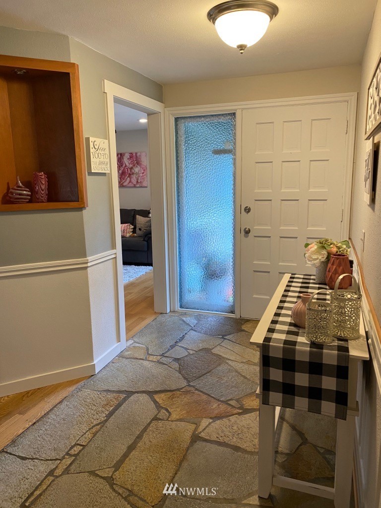14530 166th Place Southeast Renton, WA 98059 - Photo 14 of 30 a bedroom with a bed and cabinets