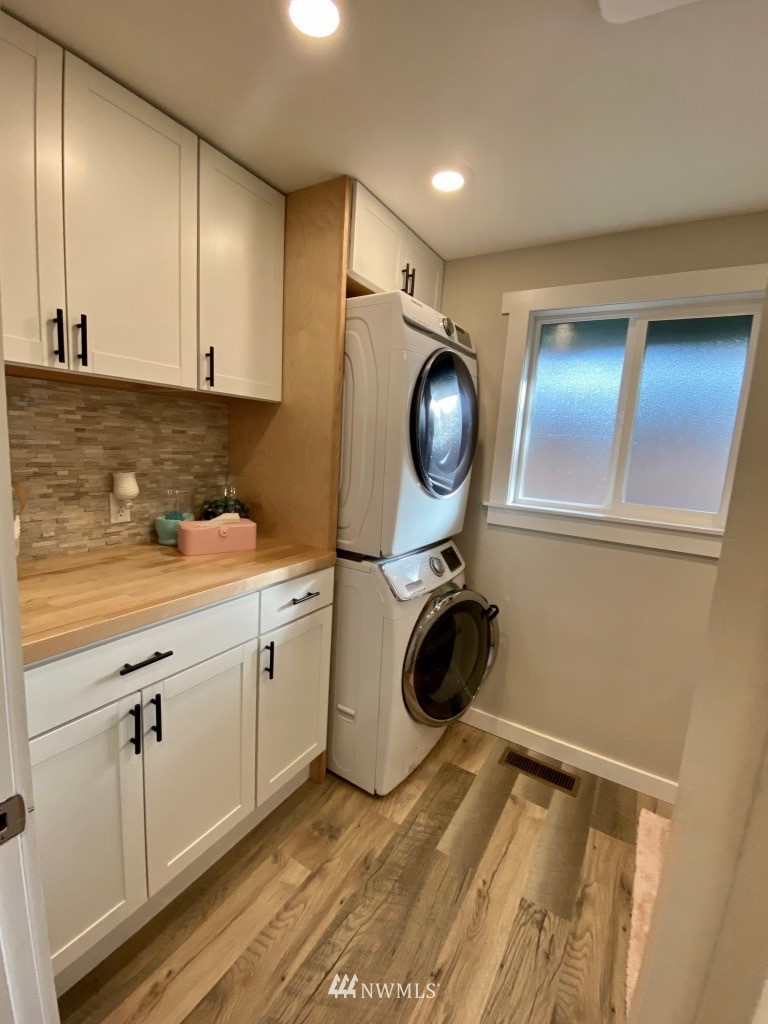14530 166th Place Southeast Renton, WA 98059 - Photo 16 of 30 a utility room with dryer and washer
