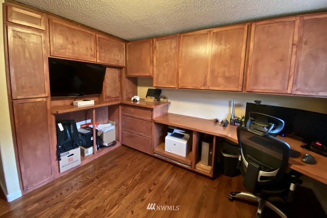 14530 166th Place Southeast Renton, WA 98059 - Photo 22 of 30 a room with furniture and a flat screen tv
