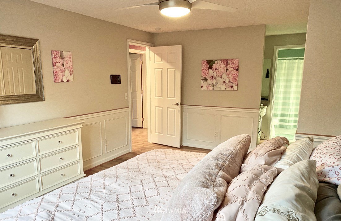 14530 166th Place Southeast Renton, WA 98059 - Photo 25 of 30 a bedroom with a bed and a cabinets