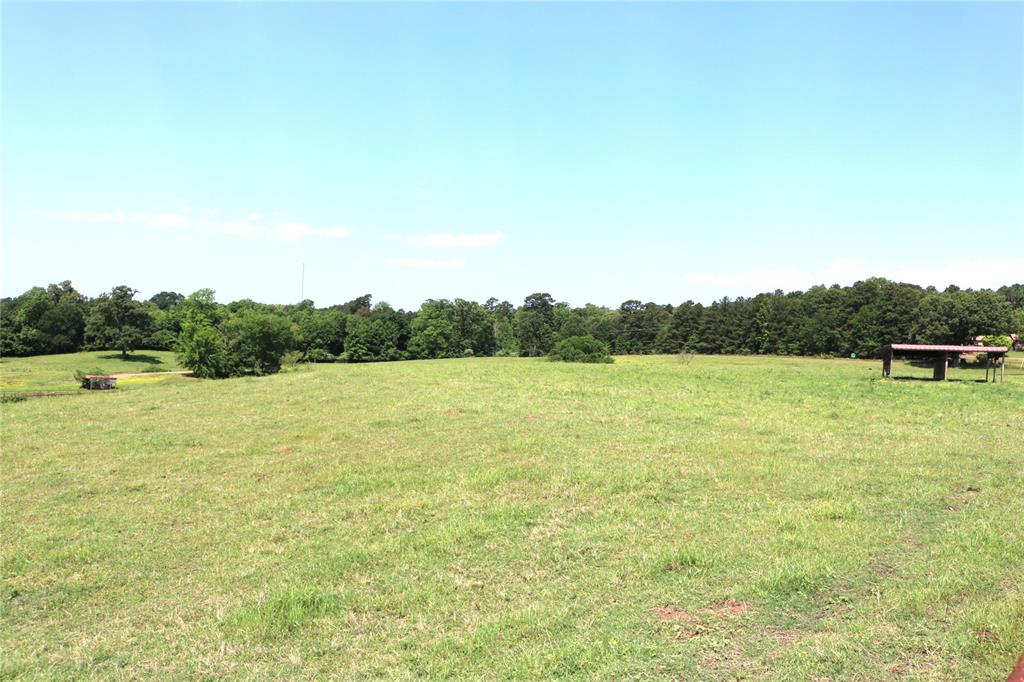 1 State Highway Ore City, TX 75683 - Photo 14 of 24 a view of lake with green field