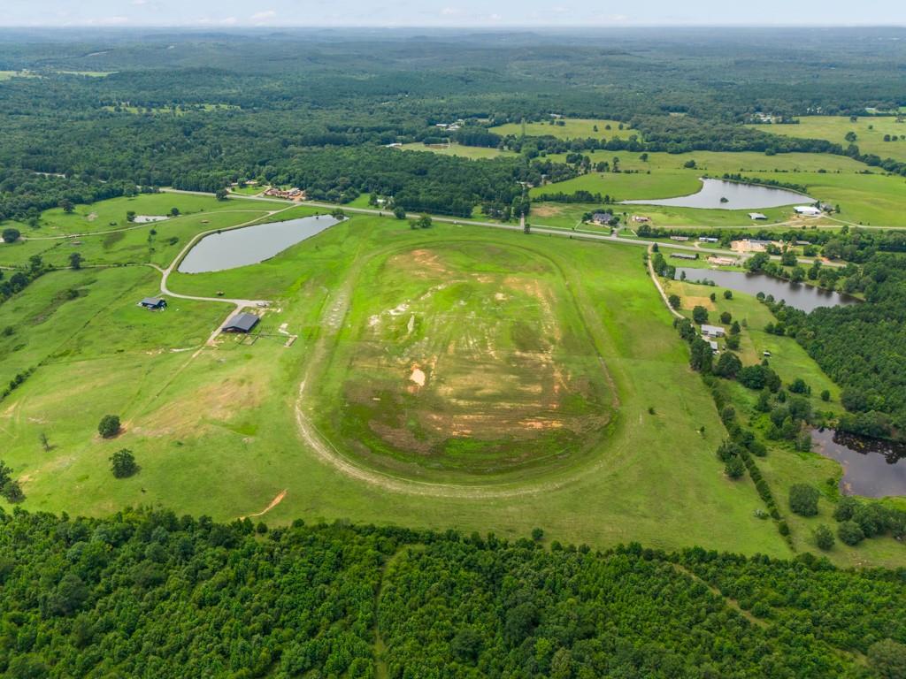 1 State Highway Ore City, TX 75683 - Photo 5 of 24 an aerial view of a residential houses with outdoor space and trees