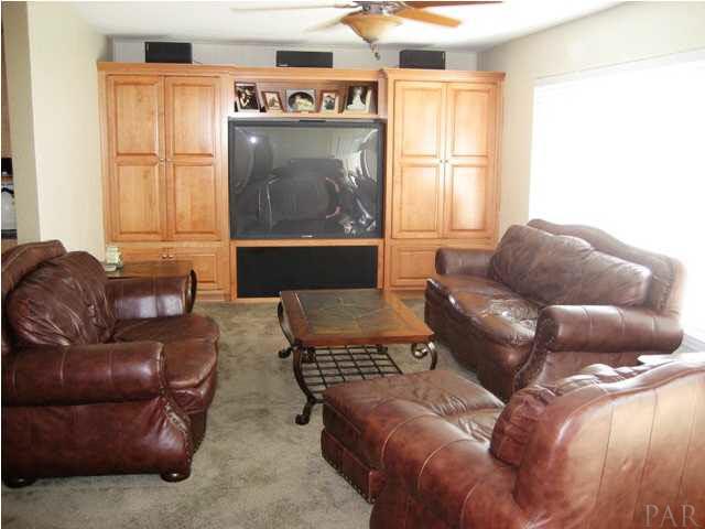 6357 Shady Lane Milton, FL 32570 - Photo 2 of 21 Beautiful built-in custom entertainment center with 60" TV