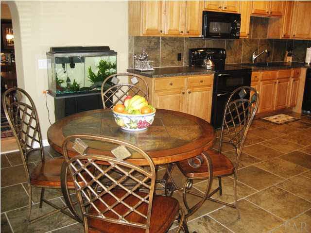6357 Shady Lane Milton, FL 32570 - Photo 3 of 21 Great eat-in area off Kitchen with beautiful tile flooring