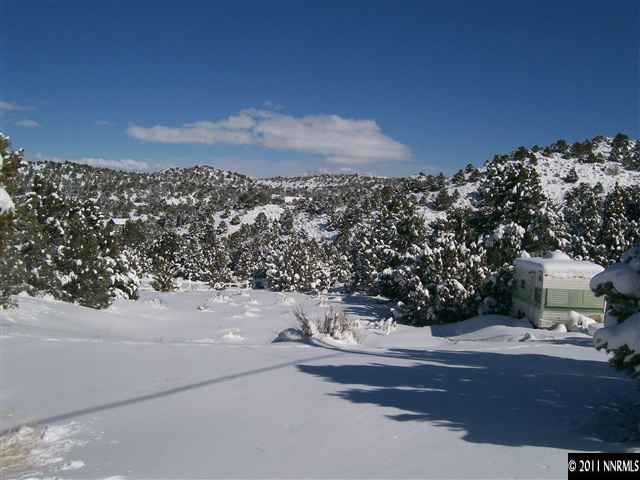 1725 Empire Road Reno, NV 89521 - Photo 6 of 9 a view of building with mountains in the background