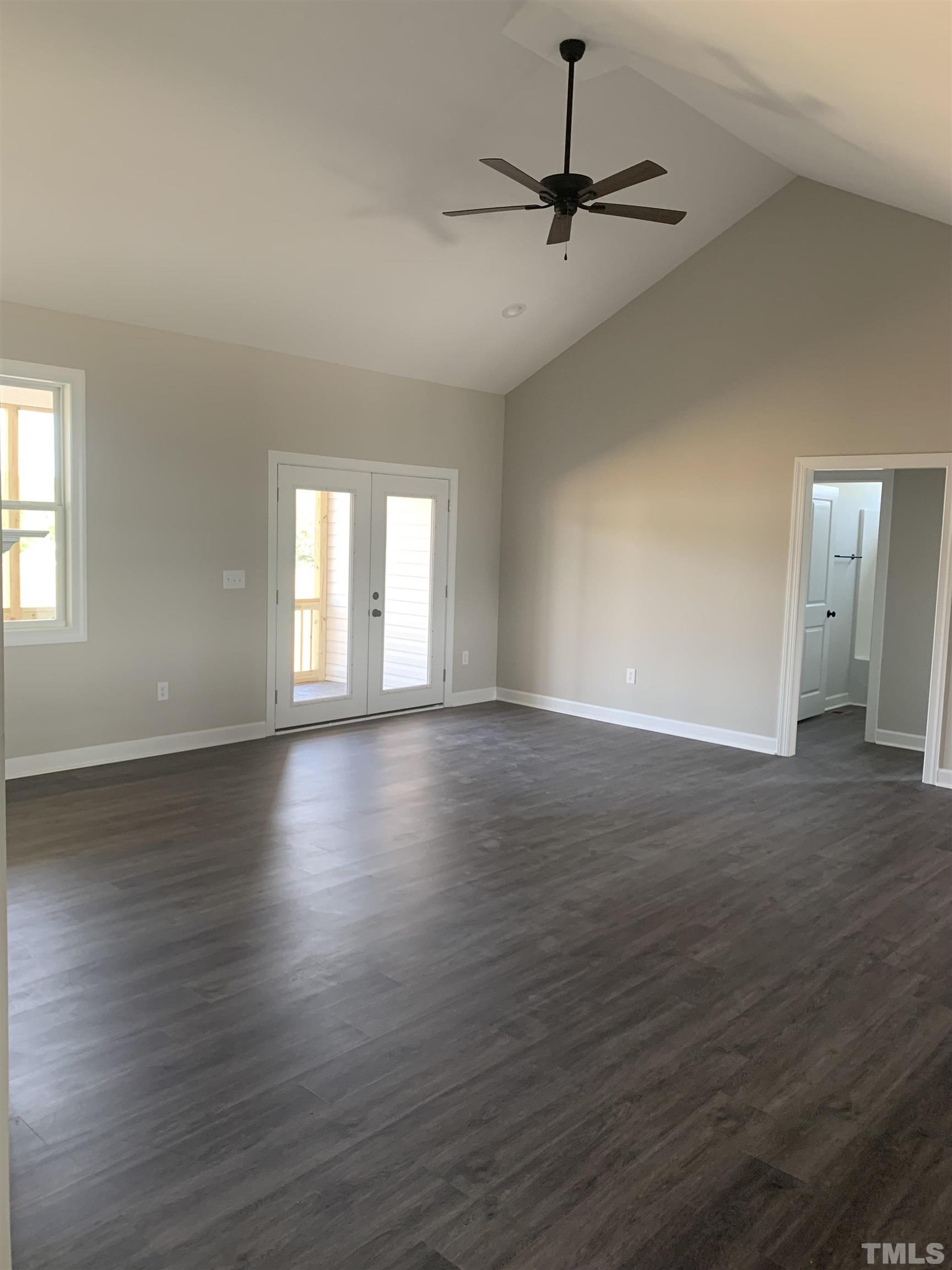 51 Knight Road Broadway, NC 27505 - Photo 2 of 5 a view of a room with wooden floor and a window