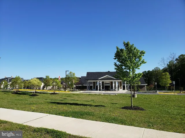 a view of a park with swings and slides