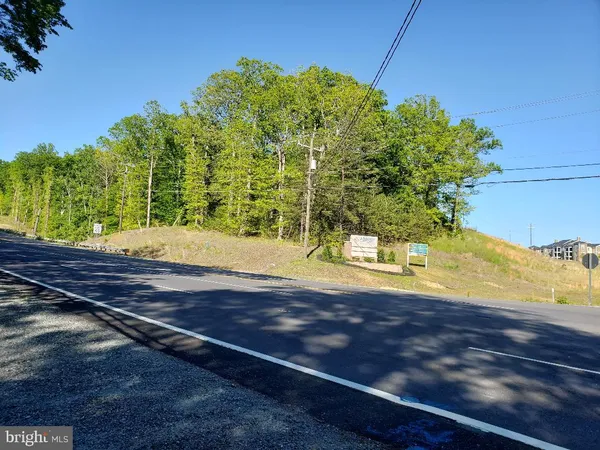 a view of a swimming pool with an outdoor space