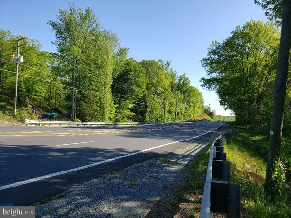 a view of a yard with an outdoor space