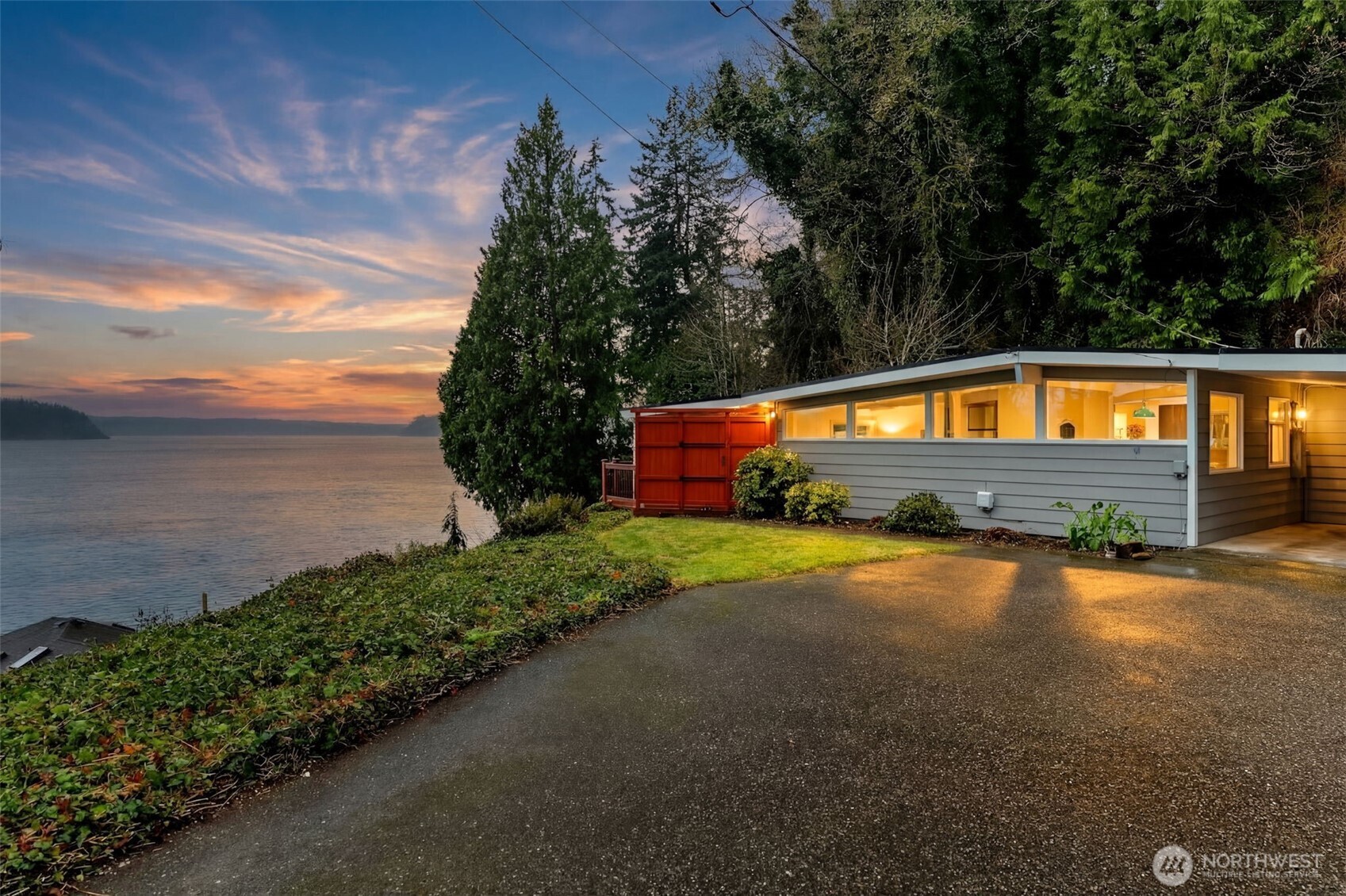 a swimming pool with outdoor seating and yard