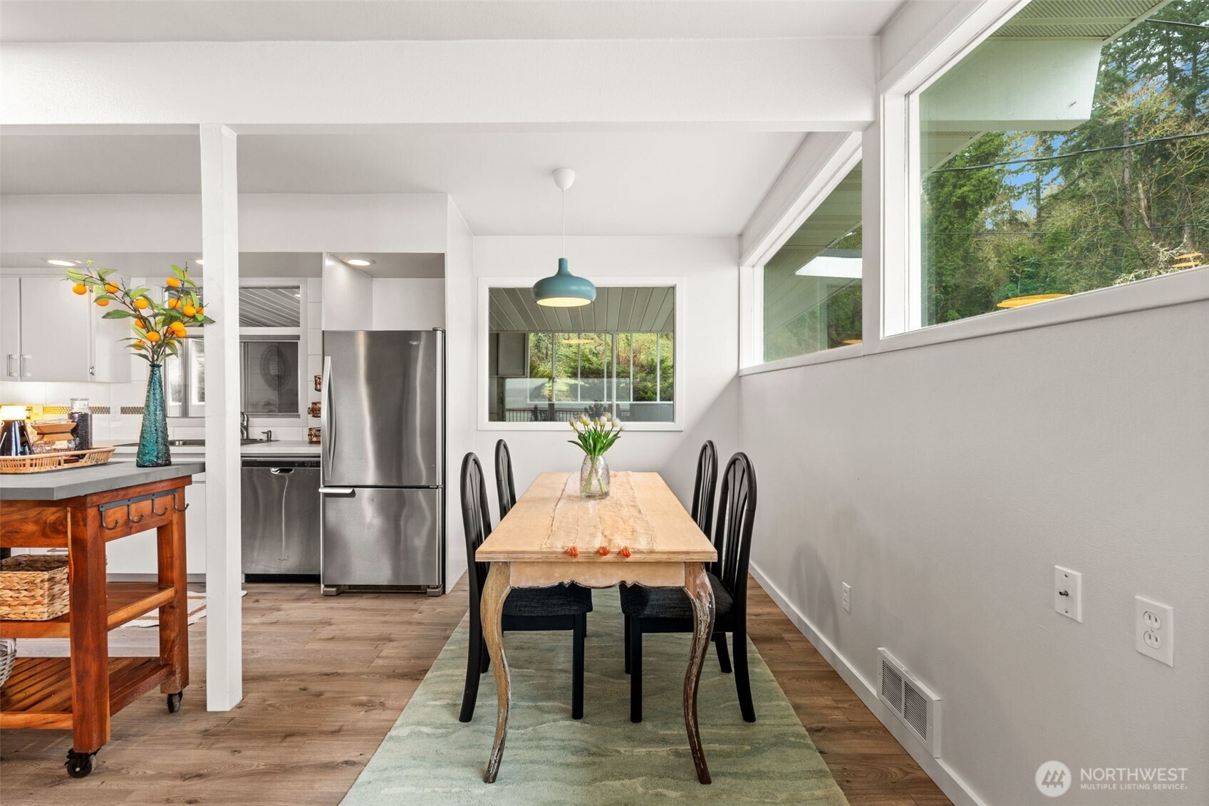 1908 Lybecker Road Northwest Gig Harbor, WA 98332 - Photo 19 of 40 a dining room with furniture and window