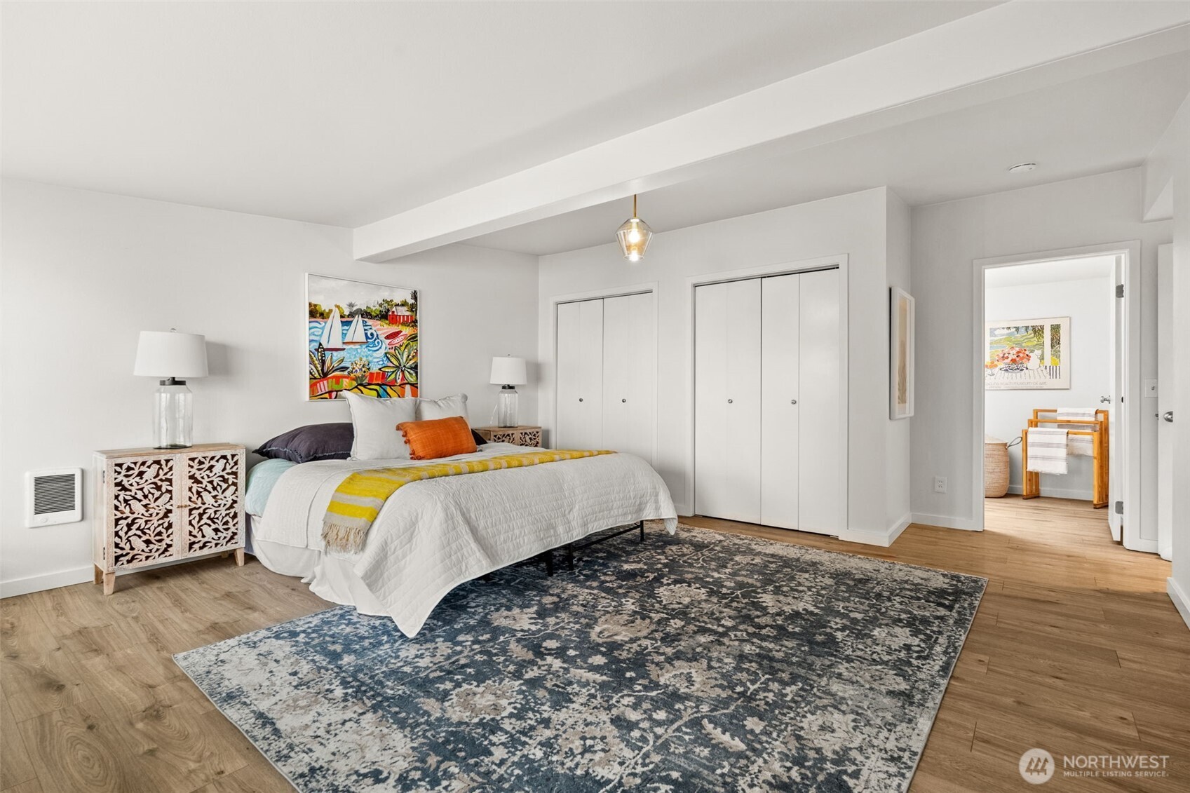 1908 Lybecker Road Northwest Gig Harbor, WA 98332 - Photo 26 of 40 a bed sitting in a bedroom and painting on the wall