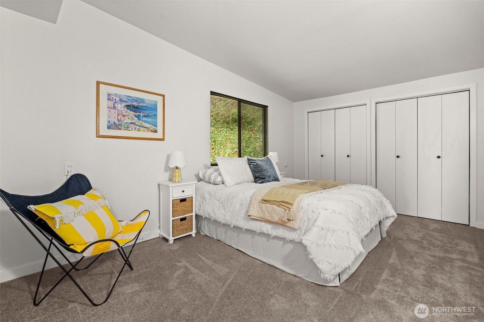 1908 Lybecker Road Northwest Gig Harbor, WA 98332 - Photo 29 of 40 a bedroom with a bed chair and window