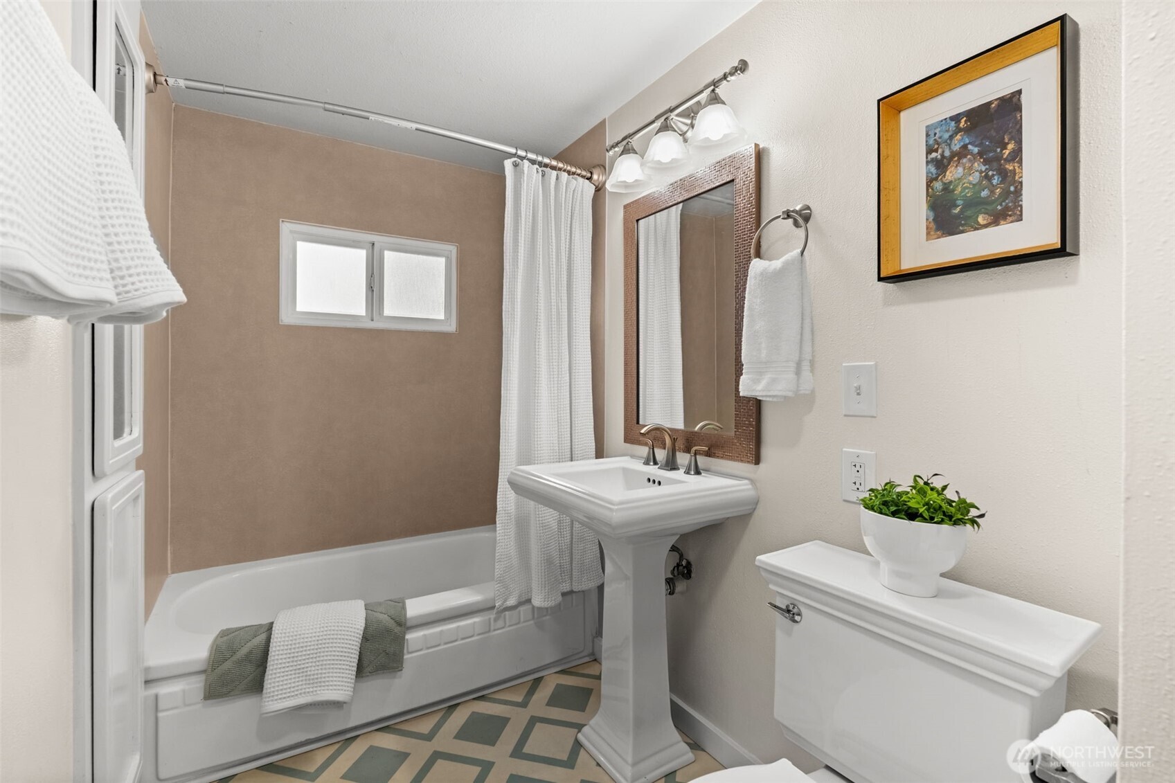 1908 Lybecker Road Northwest Gig Harbor, WA 98332 - Photo 30 of 40 a bathroom with a sink a toilet and a mirror