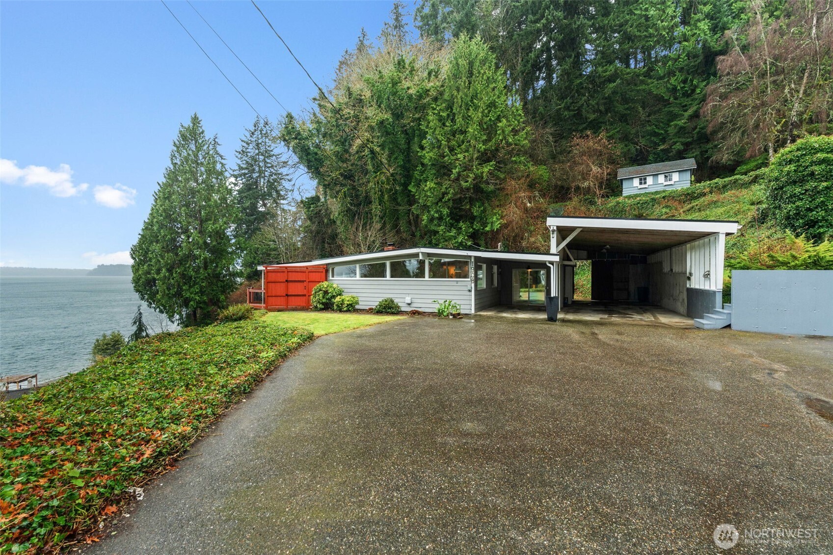 1908 Lybecker Road Northwest Gig Harbor, WA 98332 - Photo 33 of 40 a house view with a garden space