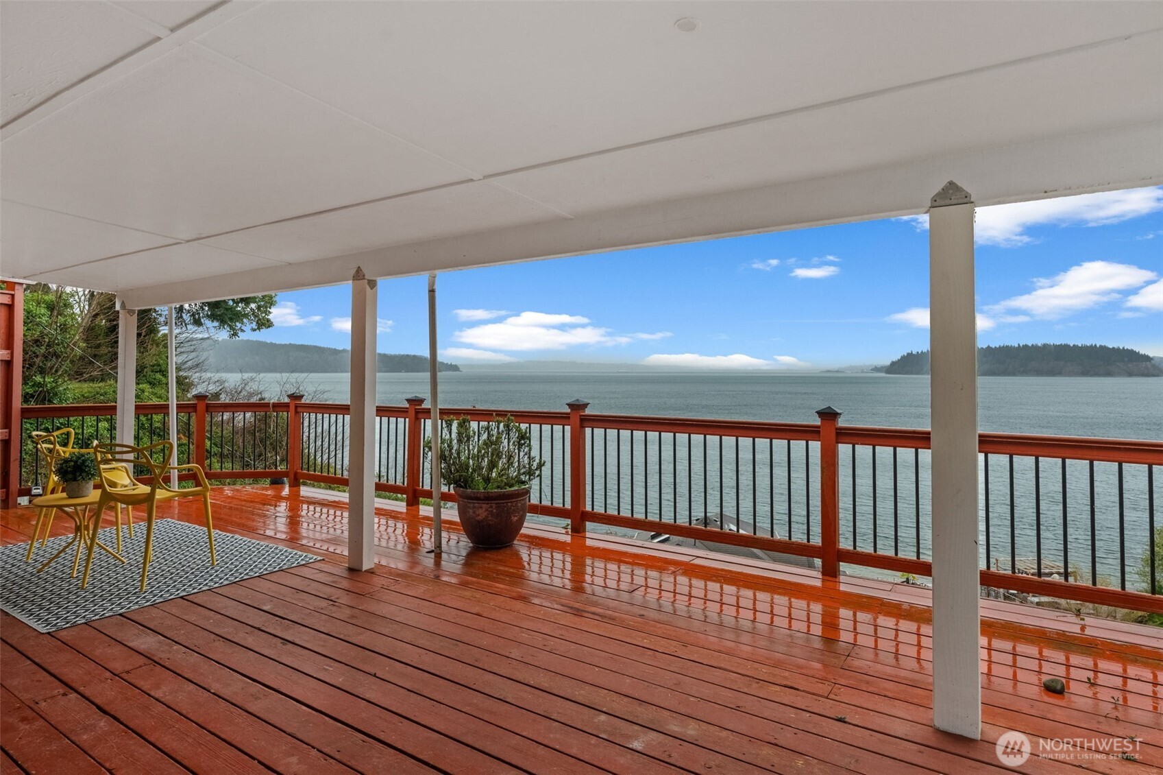 1908 Lybecker Road Northwest Gig Harbor, WA 98332 - Photo 7 of 40 a view of balcony with wooden floor