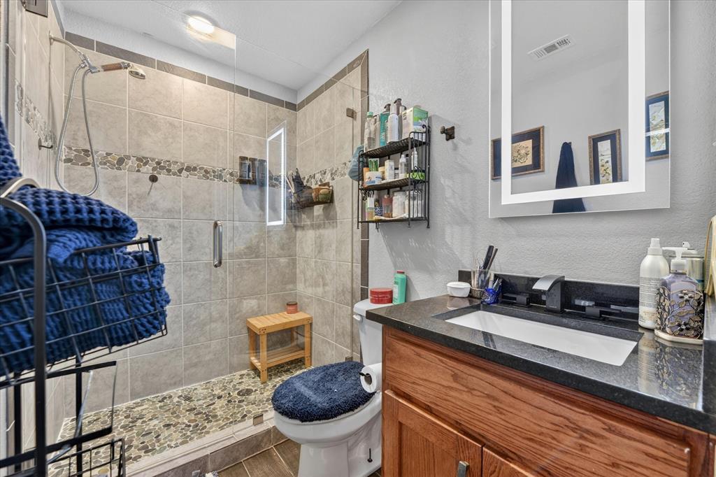 7145 Donald Road Krum, TX 76249 - Photo 20 of 35 a kitchen with a sink and cabinets