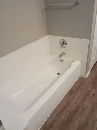 a bathroom with a bathtub