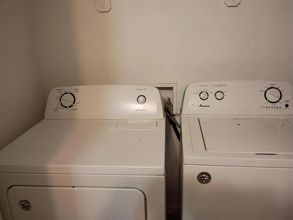 a close up view of washer and dryer