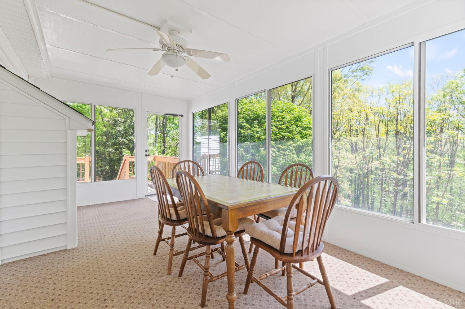 298 Braxton Ridge Road Amherst, VA 24521 - Photo 17 of 65 a view of a dining room with furniture window and outside view