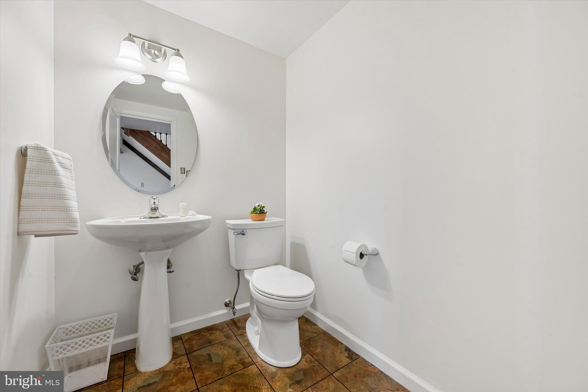 2 Lake Avenue Wallingford, PA 19086 - Photo 12 of 60 a bathroom with a toilet and a sink