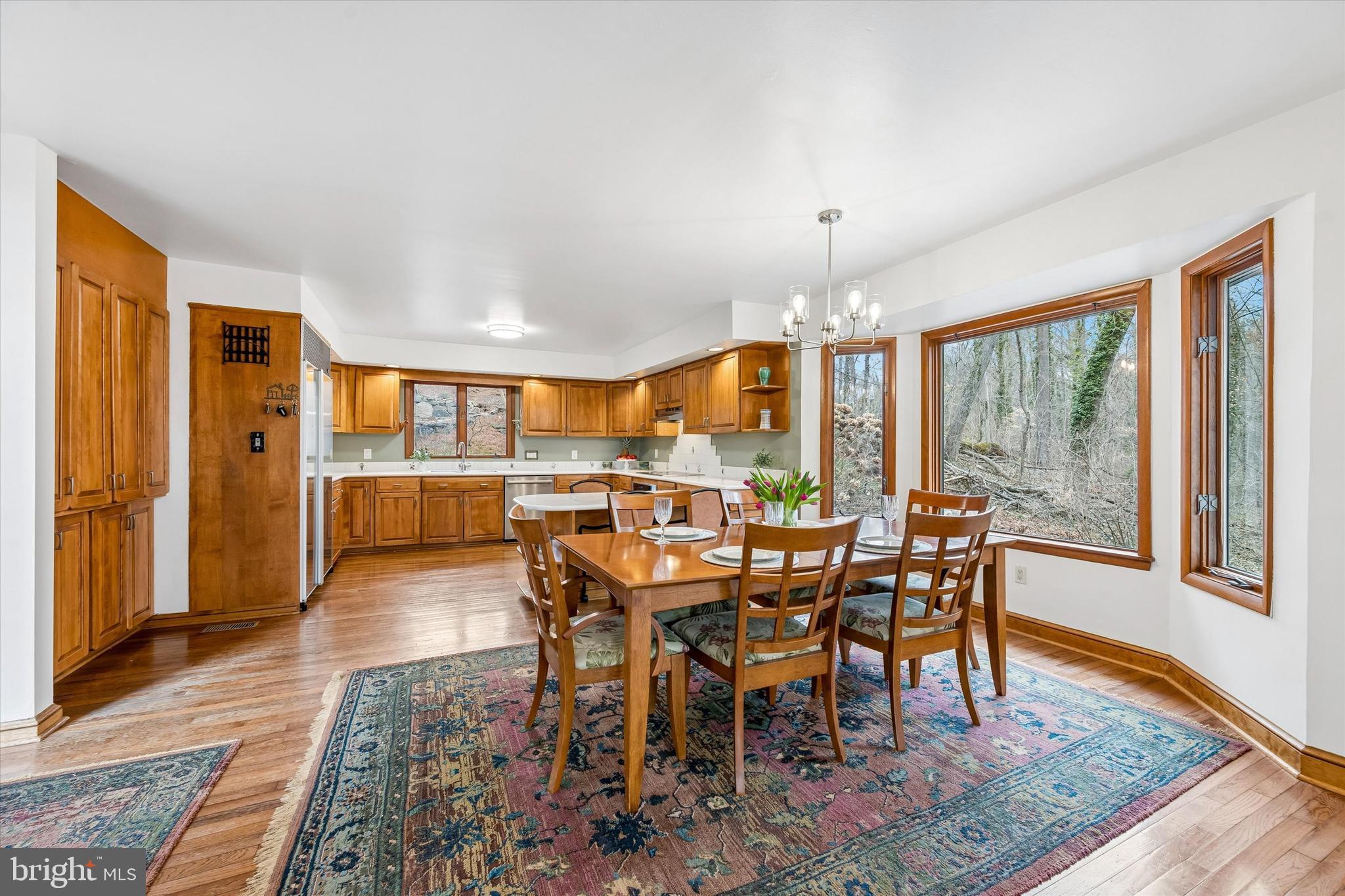2 Lake Avenue Wallingford, PA 19086 - Photo 17 of 60 a view of a dining room with furniture window and wooden floor