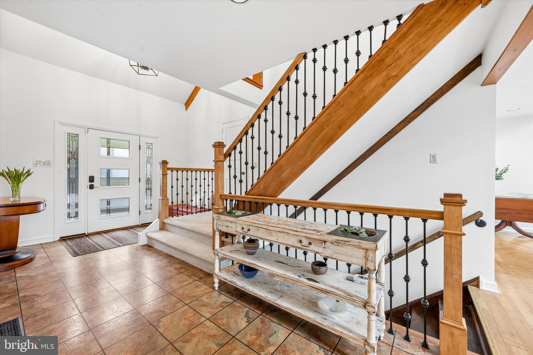 2 Lake Avenue Wallingford, PA 19086 - Photo 2 of 60 a view of an entryway wooden floor and windows
