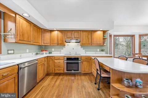 a view of an empty room with stairs