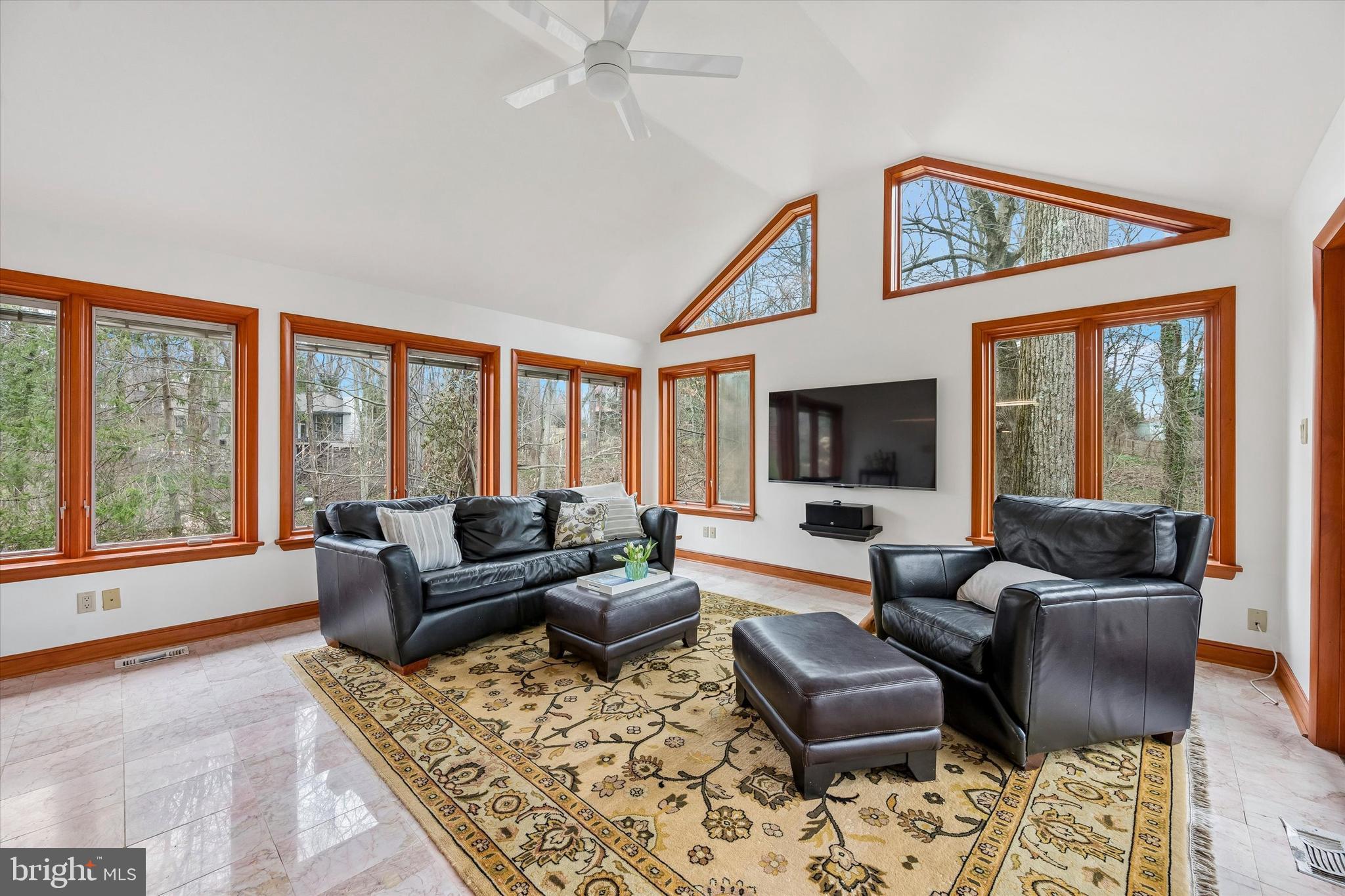 2 Lake Avenue Wallingford, PA 19086 - Photo 23 of 60 a living room with furniture and a large window